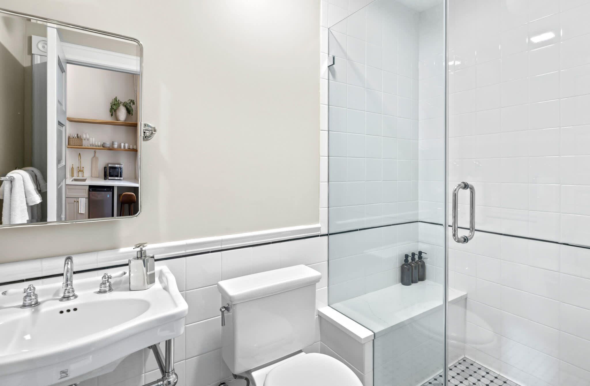 Shower, hair dryer, towels, shampoo