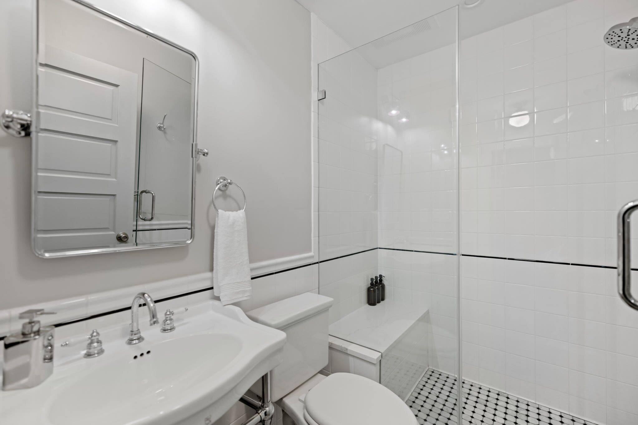 Shower, hair dryer, towels, shampoo