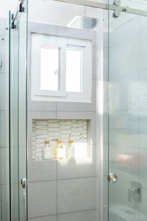 Shower, hair dryer, towels, soap