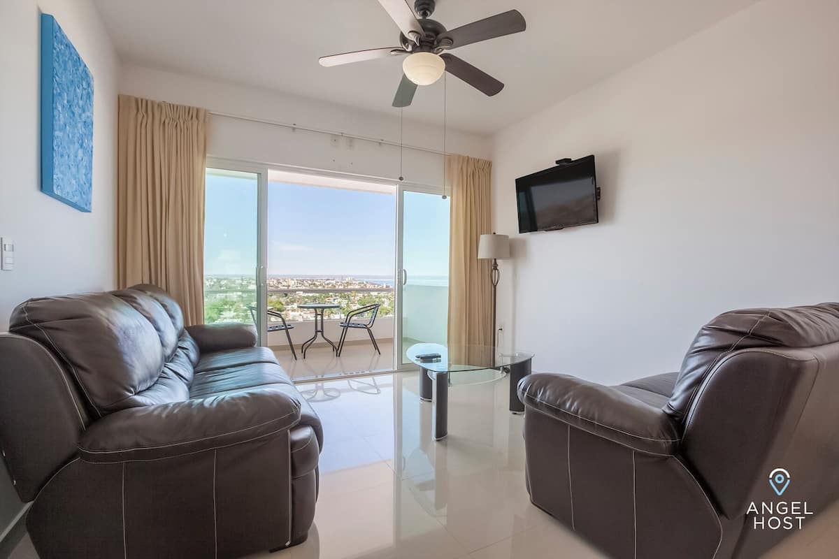 Apartment, Ocean View | Living area | 32-inch TV with digital channels, streaming services