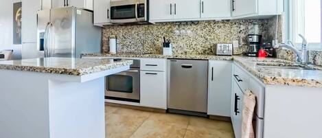 Apartment, Balcony, Ocean View | Private kitchen | Coffee/tea maker