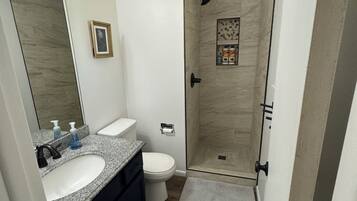 Shower, towels, soap, shampoo