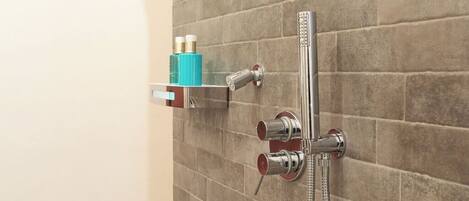 Shower, jetted tub, hair dryer, bidet