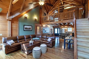 Smart TV, fireplace, books, printers
