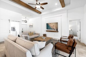 TV, table football, books - Family Oasis w/Pool, Game Room, Outdoor Kitchen Sleeps 12 (Cape Coral)