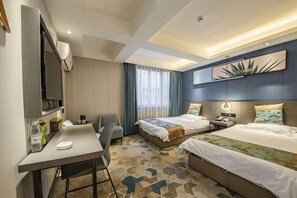 A hotel room with a desk, two beds, a TV, and a large window with curtains. - Yueyue Chain Hotel (Zhengzhou Dehua Pedestrian Street Erqi Square Subway Station) (Zhengzhou)