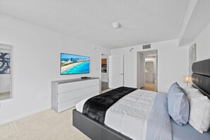 1 bedroom, desk, iron/ironing board, travel crib