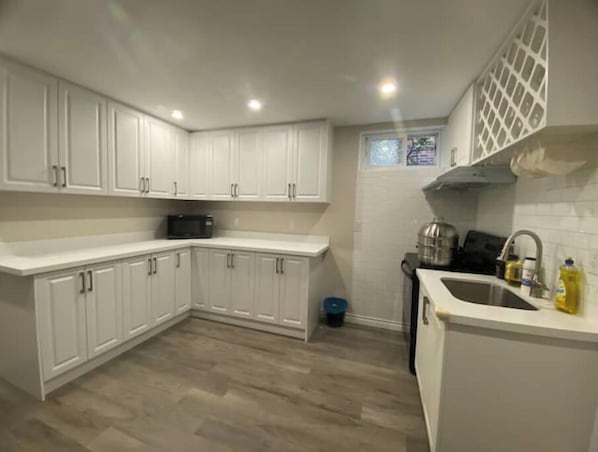 Fridge, microwave, oven, cookware/dishes/utensils