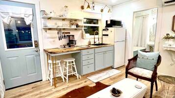 Fridge, microwave, coffee/tea maker, toaster