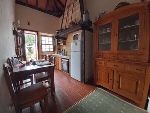 Villa | Private kitchen | Fridge, microwave, oven, stovetop