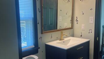 Hair dryer, towels, soap, toilet paper