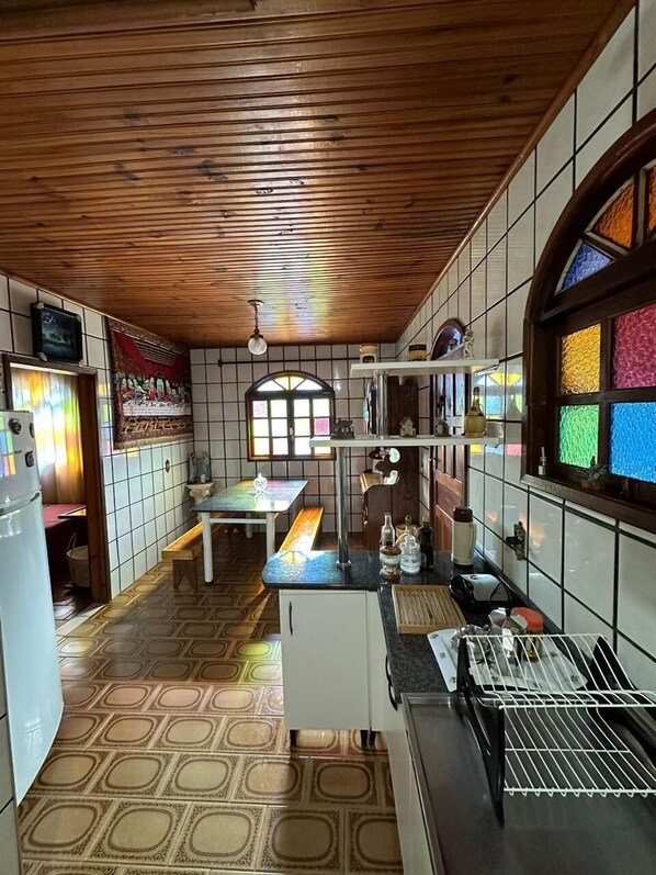 Fridge, microwave, cookware/dishes/utensils