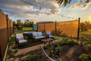 Outdoor spa tub - Waterfall Suite at Zen at the Palms with a Private Hot Tub by the Waterfall! (Homosassa)