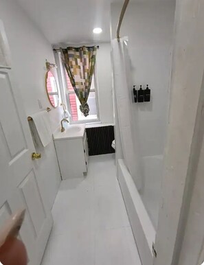 Shower, towels, soap, shampoo
