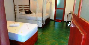 Habitación Deluxe con 1 cama matrimonial o 2 individuales, balcón | Escritorio, espacio para trabajar con laptop y wifi gratis 
