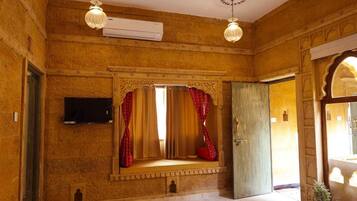 Deluxe Villa | Living area | TV
