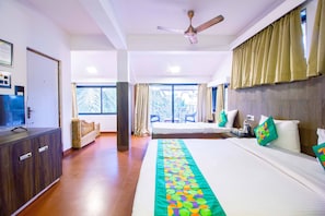 Premium Room, Pool View | Blackout drapes, iron/ironing board, bed sheets