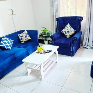 Superior Apartment, City View | Living area | 24-inch Smart TV with digital channels - JSB Apartments Bamburi (Mombasa)