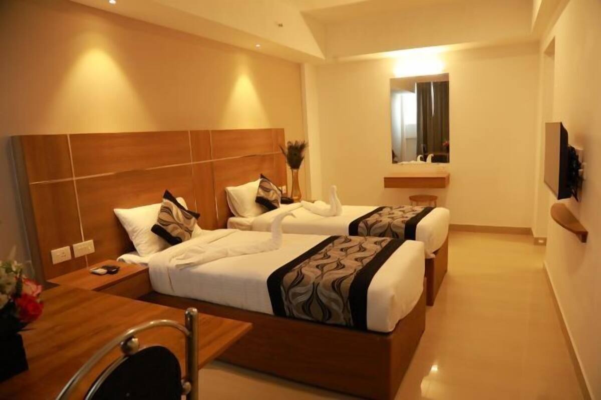 Tabla de planchar con plancha, wifi gratis, ropa de cama