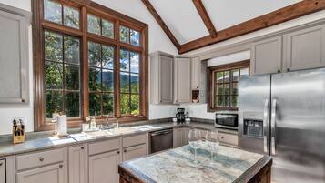 Dishwasher, toaster, blender, dining tables