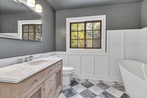 Shower, towels, soap, toilet paper