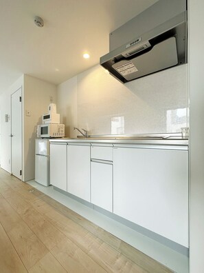 Superior-Studio, Balkon, Stadtblick | Eigene Kochnische