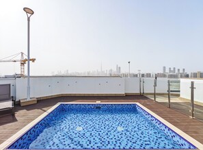 Outdoor pool - Luxury Meydan Escape Condo with City View (Dubai)