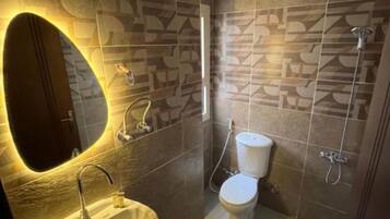 Family Room | Bathroom | Free toiletries, slippers, soap, shampoo