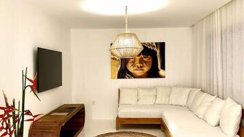 Comfort House | Living area | Flat-screen TV