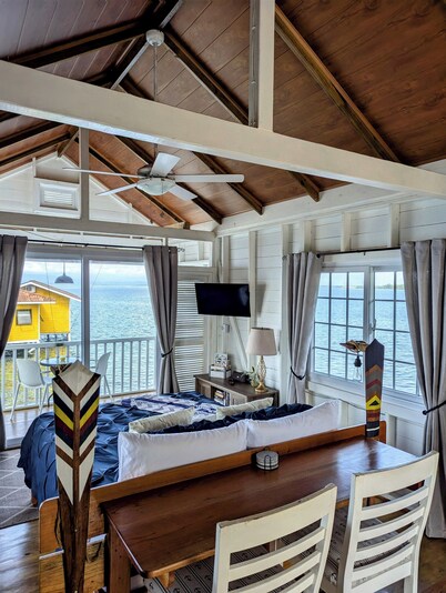 Charming bungalow over a coral reef in the Caribbean sea with stunning sunsets! 