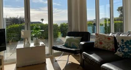 Coast Cottage - stunning sea views & large garden. Dog friendly family home