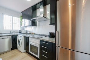 Fridge, oven, dishwasher, coffee/tea maker