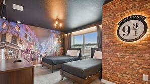 A hotel room with two beds, a mural of a city street, a brick accent wall, and a window with a view. - 5BR Storey Lake Home, Heated Pool (kissimmee)