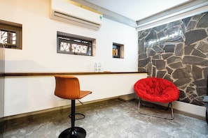 Standard Double Room | Living area | 50-inch flat-screen TV with cable channels -  KnK Inn Saigon Boutique  (Ho Chi Minh City)