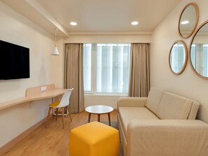 In-room safe, desk, laptop workspace, iron/ironing board - Bloom Hotel SG Highway (Ahmedabad)