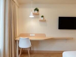 In-room safe, desk, laptop workspace, iron/ironing board - Bloom Hotel SG Highway (Ahmedabad)