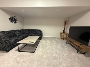 Smart TV, fireplace, DVD player, books