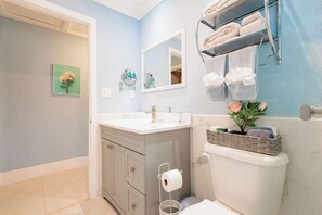 Shower, towels, soap, toilet paper