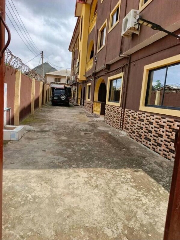 Stroll down this charming alleyway to the entrance of our building.