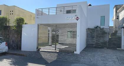 Comfortable family home close to the beach and with a large yard for your pet.