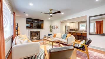 Smart TV, fireplace, books