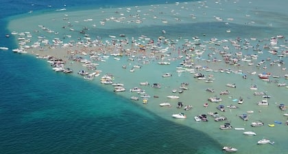 Riverside Cabin Near Torch Lake – Kayaks Included!