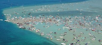 Riverside Cabin Near Torch Lake – Kayaks Included!