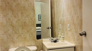 Hair dryer, towels, soap, shampoo
