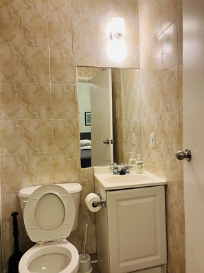 Hair dryer, towels, soap, shampoo