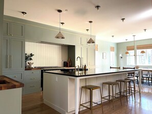 Fridge, microwave, oven, stovetop - Experience Magical Holidays in Suncadia! 7BR Luxury Lodge w/ Hot Tub + Game Room (Cle Elum)