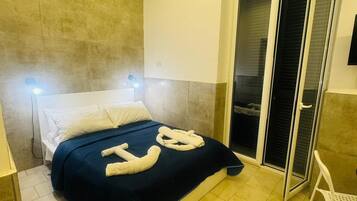 Schallisolierte Zimmer, BĂŒgeleisen/BĂŒgelbrett, kostenloses WLAN