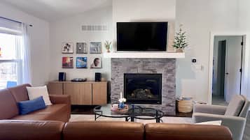 Smart TV, fireplace, foosball, books