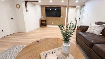 Smart TV, fireplace, foosball, books