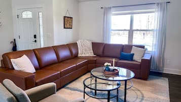 Smart TV, fireplace, table football, books